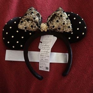Fancy Minnie Mouse ears.